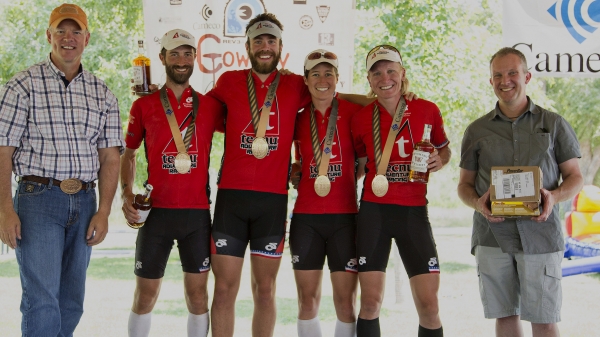 people posing with medals